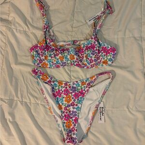 NWT floral adorable swimsuit
BRIGHT SWIMWEAR